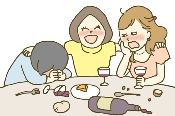 お酒を飲んで顔が赤くなっている女性達